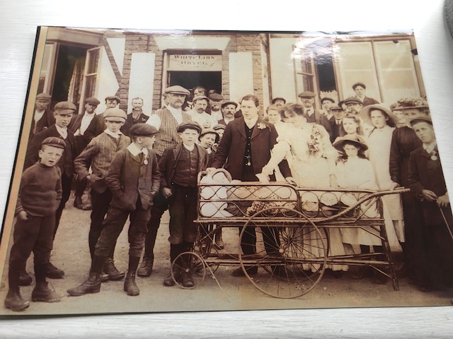 Mottram Family in front of the Whir=te Lion, circa 1903/4